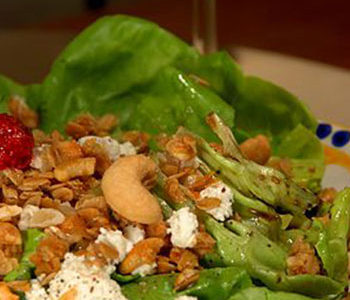 Sweet and savory salad with granola.