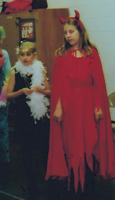 Elizabeth in devil Halloween costume.