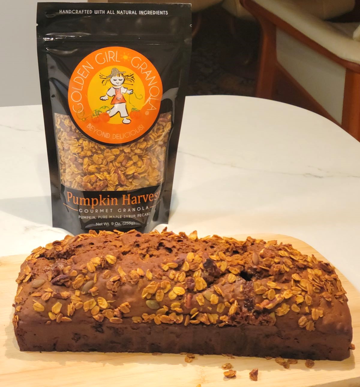 Pumpkin tea loaf with Pumpkin Harvest granola bag.